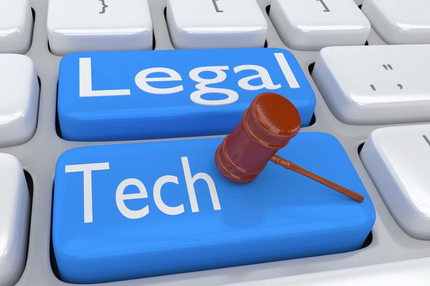 judge gavel over a legal tech button on keyboard